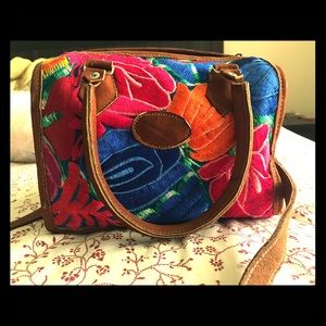 Colorful flowered purse bough in El Salvador